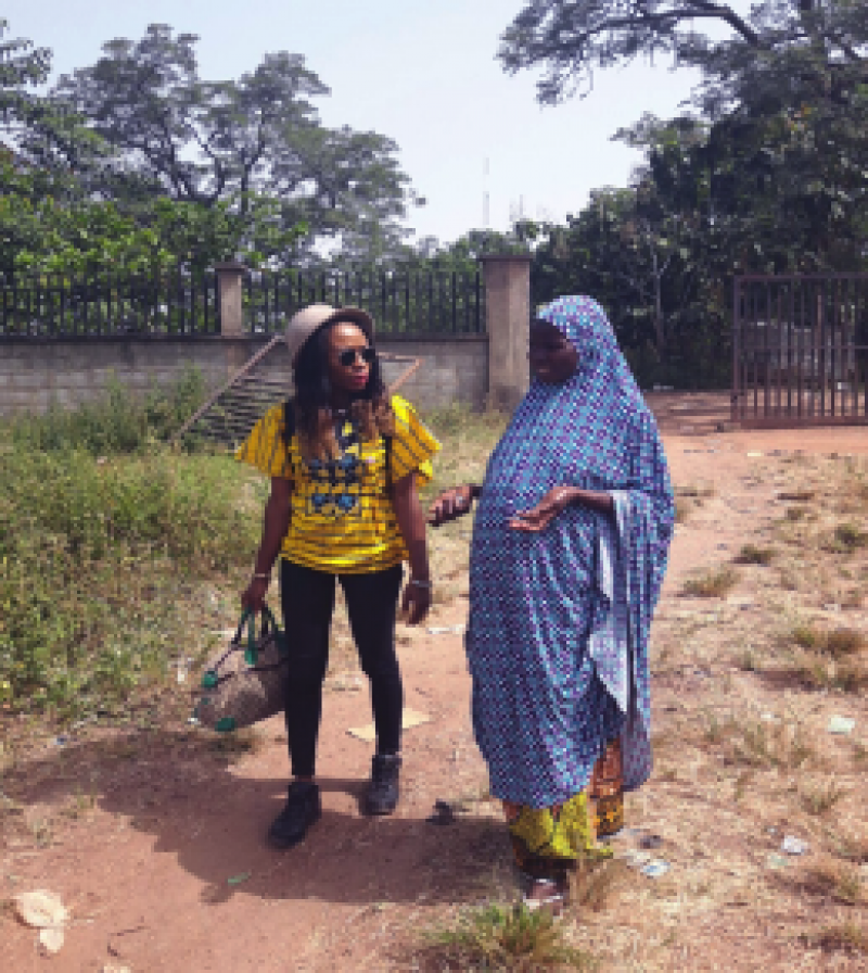 Ijeoma and Amina at Internally Displaced Persons' camp talking about pregnancy