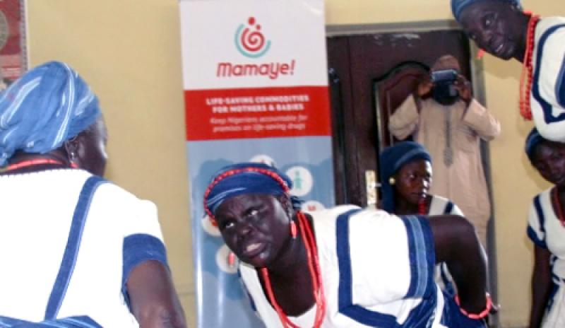 Mamaye banner and woman