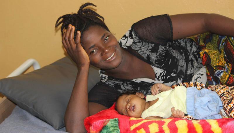 Picture of smiling mother and baby